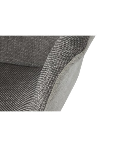 Silla de pu en gris oscuro con patas metal.