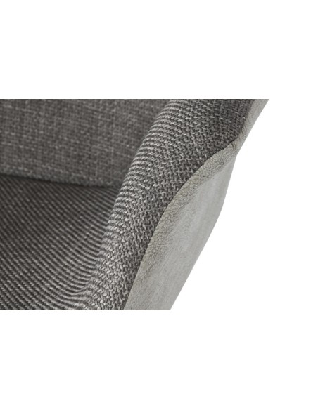 Silla de pu en gris oscuro con patas metal.