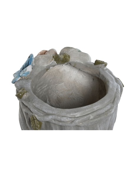 Macetero de chica con flores