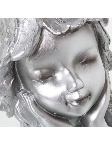 Figura niña plateada