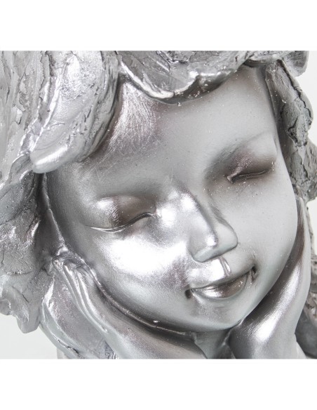 Figura niña plateada