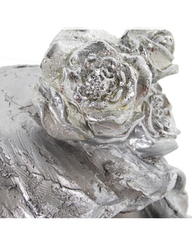 Figura niña plateada