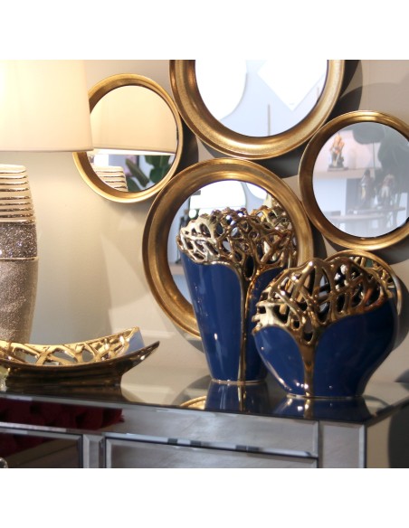 Jarrón de cerámica azul y dorado